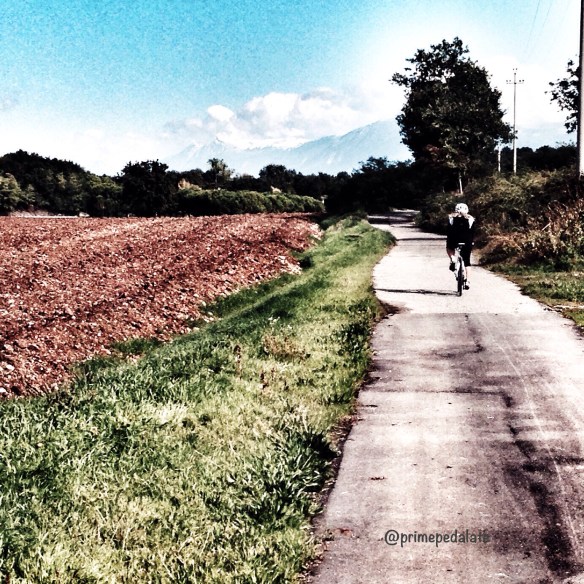 Cycling towards the lake of Garda